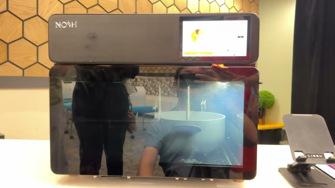 Nosh food robot's spice dispenser